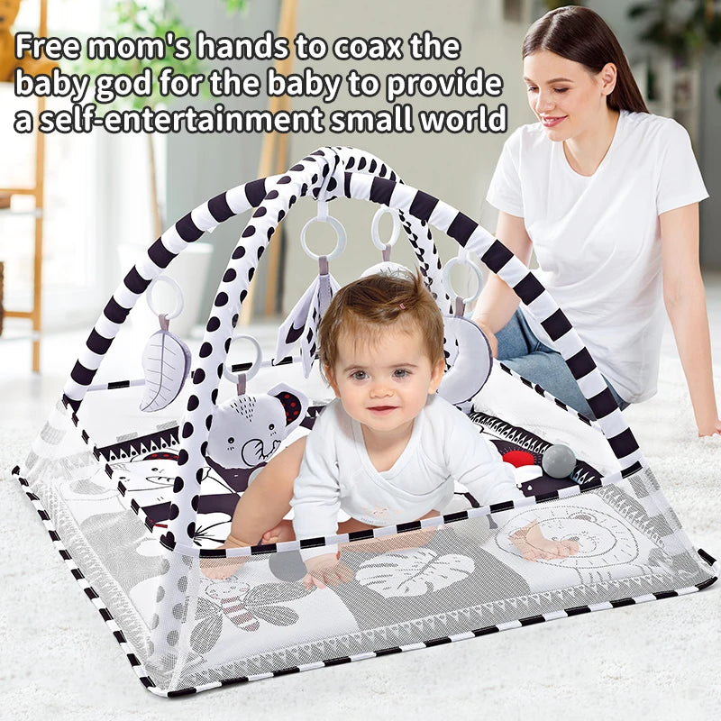 Tapis de jeu bébé - bébé en tummy time