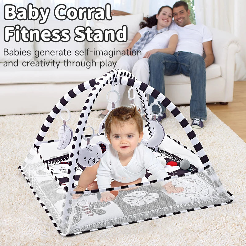 Tapis de jeu bébé - jouets suspendus au portique